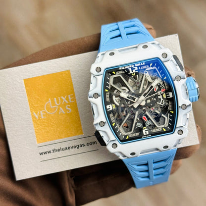 Richard Mille white carbon fiber sports watch—skeletonized dial and blue rubber strap