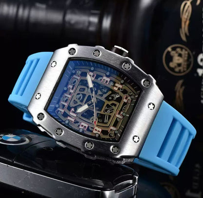 Richard Mille white carbon fiber sports watch—skeletonized dial and blue rubber strap