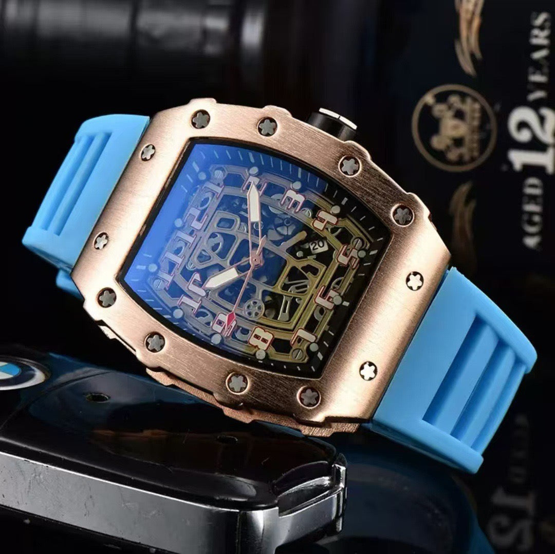 Richard Mille white carbon fiber sports watch—skeletonized dial and blue rubber strap