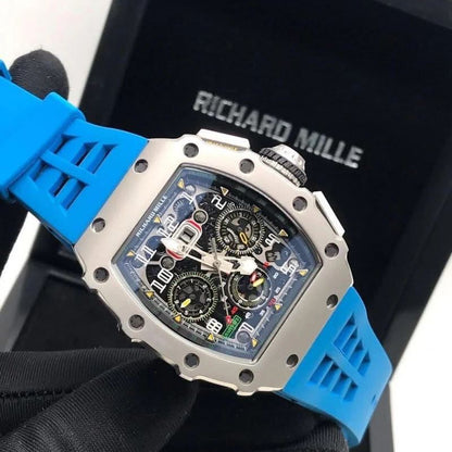 Richard Mille white carbon fiber sports watch—skeletonized dial and blue rubber strap